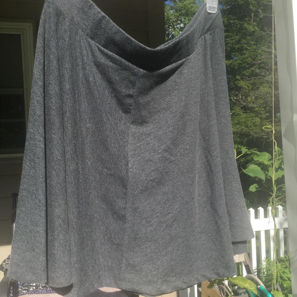 Grey Skirt. **Proceeds to Charity**